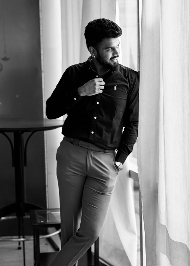 Black-and-white portrait of Pratik Shinde, founder of Fotopro